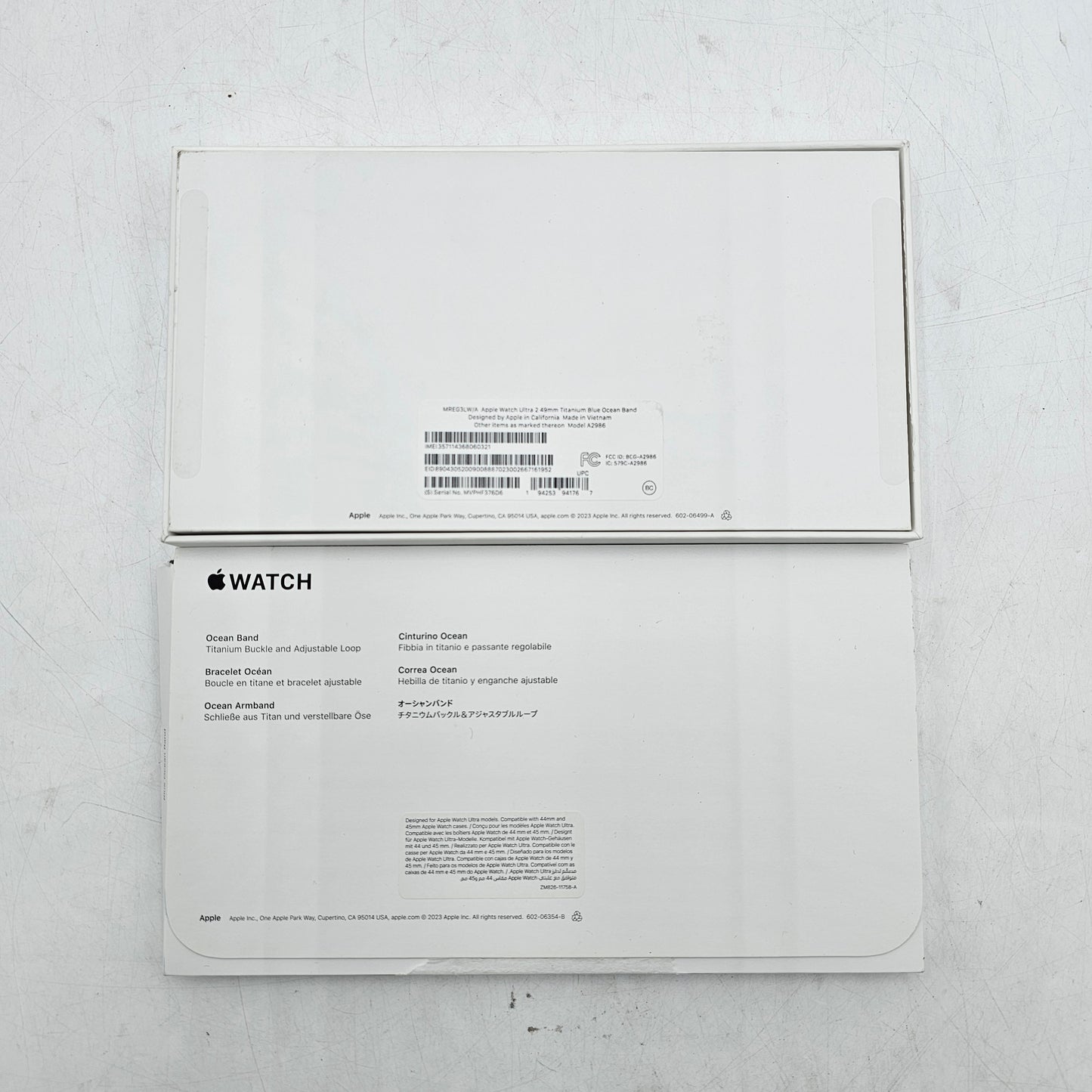 Unlocked Apple Watch Ultra 2 49MM Natural Titanium Blue Ocean Band MREG3LW/A